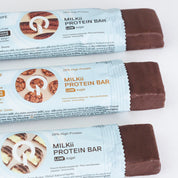 Barra de proteina QNT - Milkii Coconut Flakes (12 unidades)